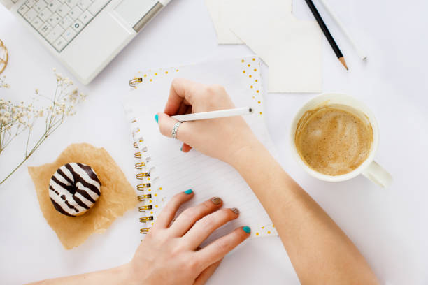 Girl writing in a notebook